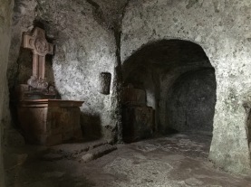 Inside the cliff catacombs at St. Peter's Cemetery