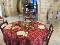 Breakfast (croissants, pastries, ham and cheese, eggs, fruit) at our Ortona hotel