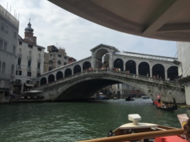 Riding the vaporetti water busses along the grand canal in Venice
